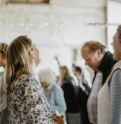 a group of people standing next to each other